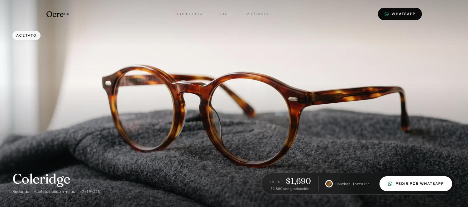 Hero de Ocre 64: armazón redondo de acetato tortoise sobre una manta gris, con el precio y el botón de pedido